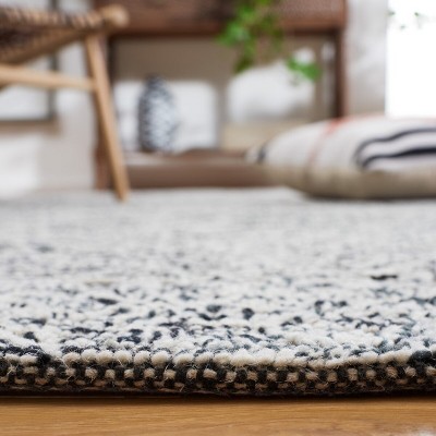Handmade Black and Ivory Geometric Wool Area Rug, 6' Square