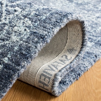 Blue Hand-Tufted Wool and Synthetic 4' x 6' Area Rug