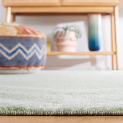 Sage and Ivory Geometric Synthetic Area Rug