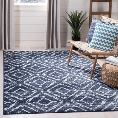 Navy and Ivory Geometric 4' x 6' Synthetic Area Rug