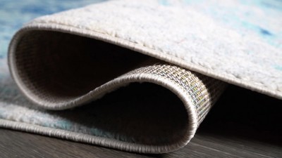 Ivory and Charcoal Abstract Synthetic Area Rug
