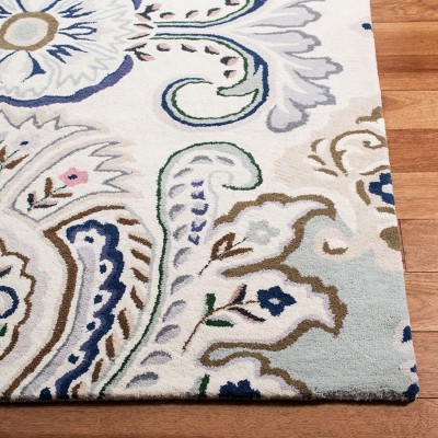 Ivory and Blue Hand-Tufted Wool 9' x 12' Area Rug