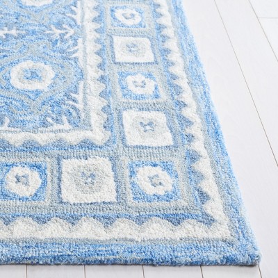 Ebony EBN651 Handmade Tufted Rug - Safavieh