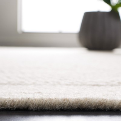 Ivory Hand-Knotted Wool 6' x 9' Rectangular Area Rug