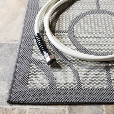Elegant Reversible Gray Synthetic 4' x 5'7" Indoor/Outdoor Rug