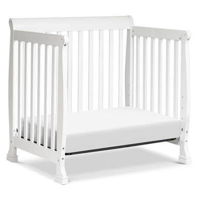White Wooden 4-in-1 Convertible Mini Crib and Dresser Set