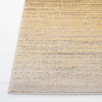 Gold and Ivory Hand-knotted Synthetic Area Rug