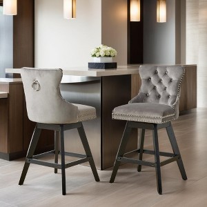 Leovsnove Velvet Swivel Bar Stool Set of 2,Counter Height Upholstered Rotating Barstools with Wood Legs,Footrest,Chrome Nailhead - 1 of 4