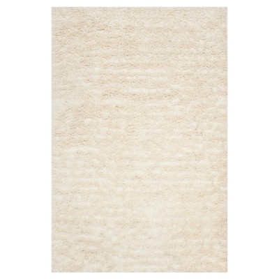 Ivory Solid Knotted Area Rug - (6'x9') - Safavieh