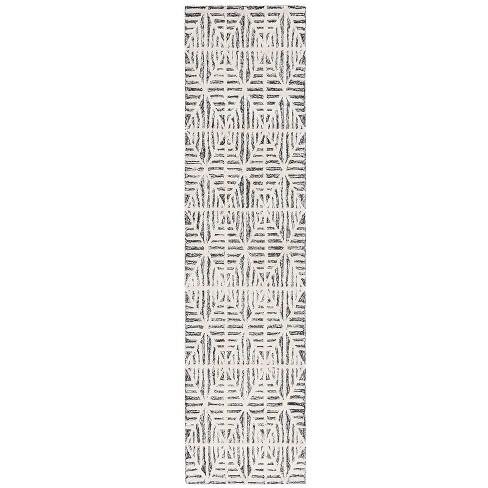 Ebony EBN110 Hand Tufted Area Rug  - Safavieh - image 1 of 4