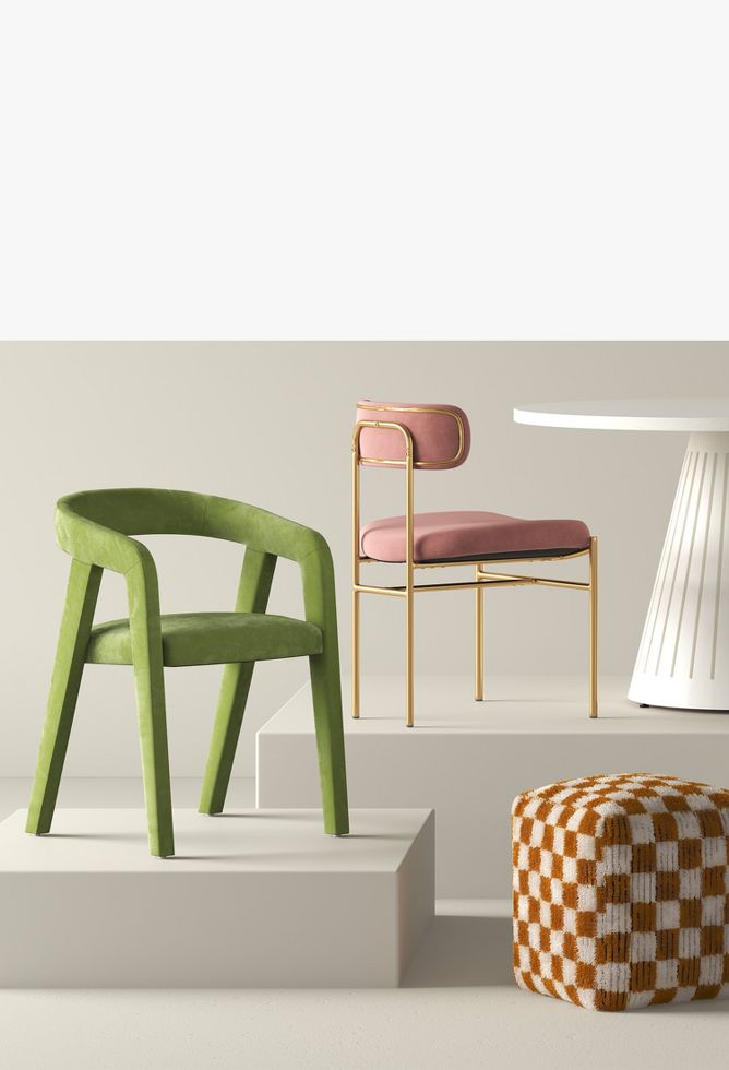 Modern furniture collection with a green velvet chair, a white table, pink and gold colored chairs, a white couch with a blue pillow, and a checkered ottoman against a neutral background.