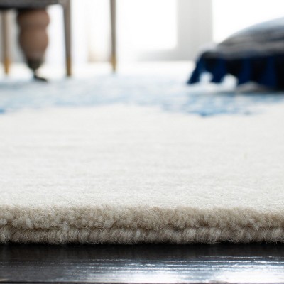 Ivory and Blue Hand-Tufted Wool Area Rug 5' x 8'