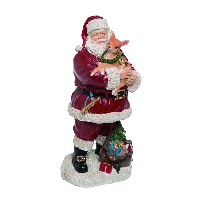 Transpac Resin 12 in. Red Christmas Santa with  Deer