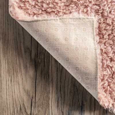 Easy-Care Reversible Pink Shaggy Sheepskin Synthetic Rug 3' x 5'