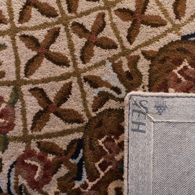 Elegant Ivory Oval Hand-Tufted Wool Area Rug, 7'6" x 9'6"