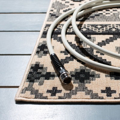 Black and Beige Rectangular Synthetic Indoor/Outdoor Rug
