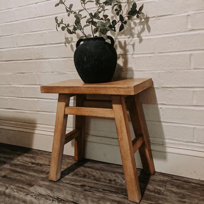 Small wooden store stool target