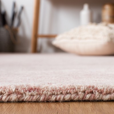 Hand-Tufted Pink and Ivory Wool Area Rug, 5' x 8'