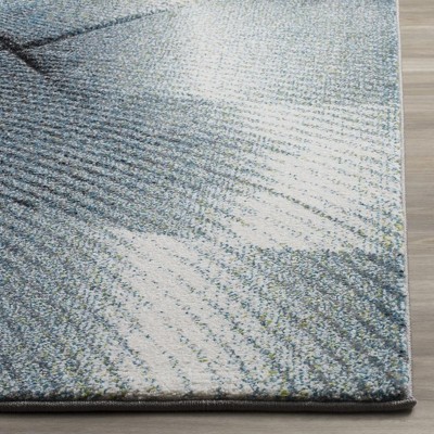 Grey and Teal Geometric Medium Pile Area Rug, 6'7" x 9'