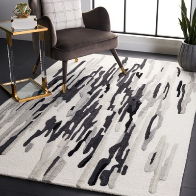 Black and Ivory Hand-Tufted Wool 4' x 6' Area Rug