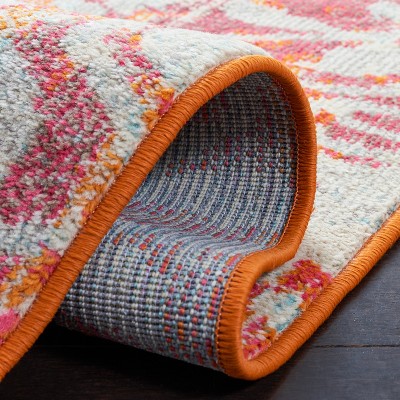 Ivory and Orange Geometric Flat Woven Area Rug