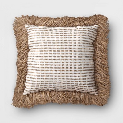 brown and white throw pillows