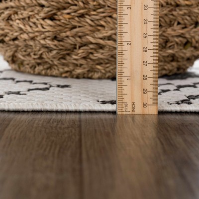 Haynesville Black and White Geometric Polypropylene Outdoor Rug