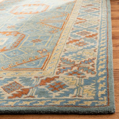 Handmade Blue and Beige Wool Tufted 6' x 9' Area Rug