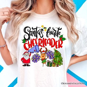 Santa’s Favorite Cheerleader T-Shirt, Sparkly Holiday Christmas Tee | OrnamentallyYou - 1 of 4