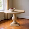 HomeRoots 48" Natural Solid Wood Pedestal Base Round Top Dining Table - 2 of 4
