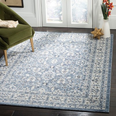 Charleston Navy and Creme Synthetic Oriental Area Rug 5'3" x 7'6"