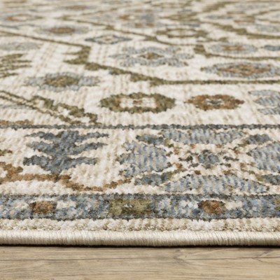 Hastings Ivory and Green Synthetic Rectangular Area Rug 5'3" x 7'6"