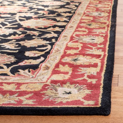 Elegant Heritage Hand-Tufted Black Wool Rectangular Rug 6' x 9'