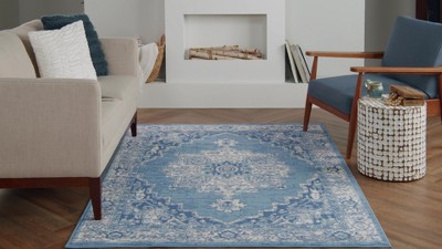 Ivory Blue Floral Synthetic 5' x 7' Reversible Area Rug