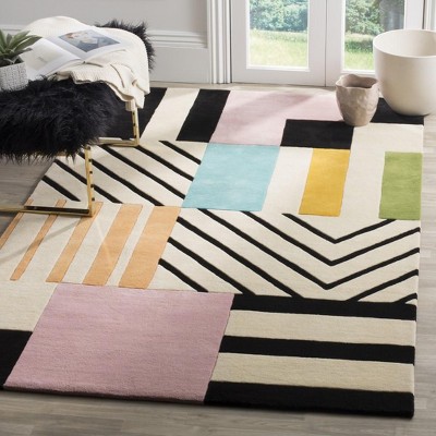 Geometric Black and Ivory Handmade Tufted Wool Rug 4' x 6'