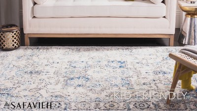 Ivory and Orange Rectangular Synthetic Area Rug