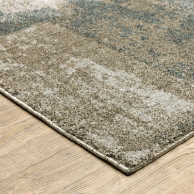 Alton Blue and Brown Synthetic Rectangular Area Rug 5'3" x 7'6"