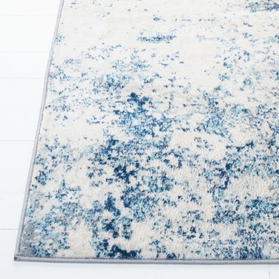 Ivory and Navy Square Synthetic Stain-Resistant Area Rug