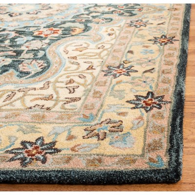 Handmade Black Wool Round Tufted Area Rug