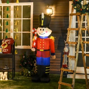 6' Christmas Inflatable Nutcracker Toy Soldier with Candy Cane, Outdoor Blow-Up Yard Decoration with LED Lights Display - 1 of 4