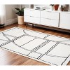 Ivory And Black Geometric Area Rug - 2 of 4