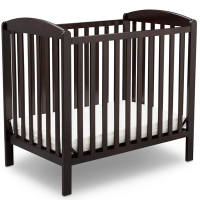 Delta emery store mini crib