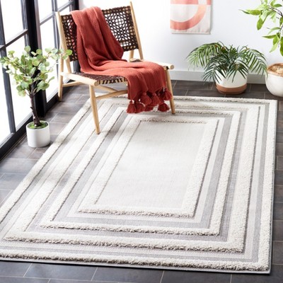 Ivory Synthetic 8' x 10' Easy-Care Indoor/Outdoor Area Rug