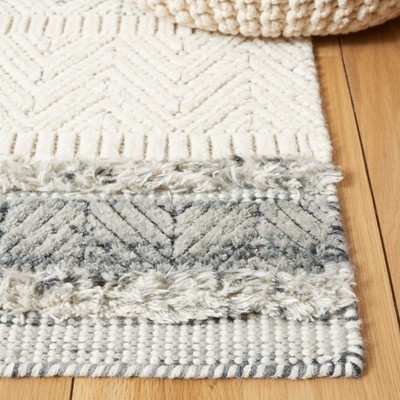 Ivory Hand-Tufted Wool and Synthetic 9' x 12' Rectangular Rug