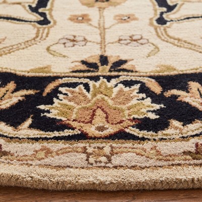 Elegant Heritage 6' Round Beige Hand-Tufted Wool Area Rug