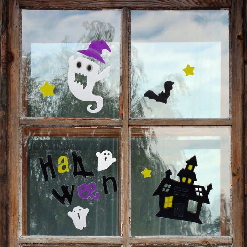 Northlight 15-Piece Purple and Black Haunted House Halloween Gel Window Clings, 1 of 3