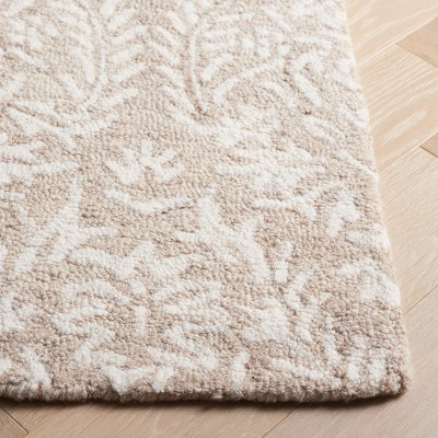 Ivory and Beige Hand-Tufted Wool Rectangular Area Rug 6' x 9'