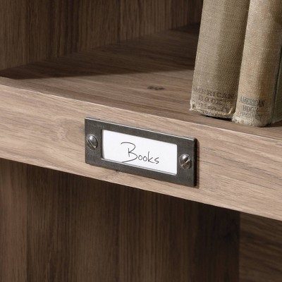 Barrister Lane 60'' Salt Oak Adjustable Cubby Bookcase with Metal Hardware