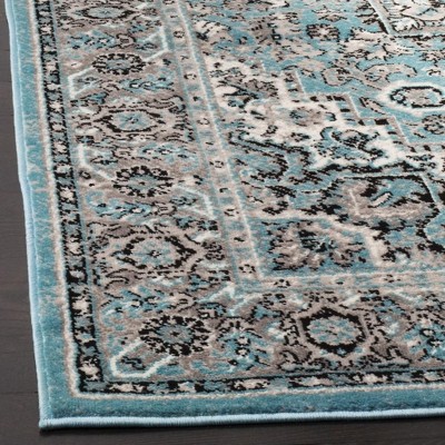 Boho Chic Blue Medallion 59" Synthetic Area Rug