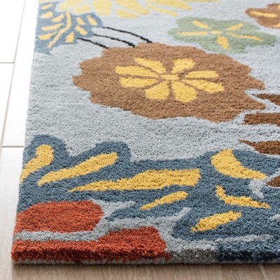 Handmade Blue and Multicolor Wool and Viscose Floral Area Rug